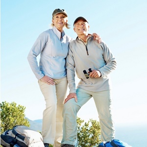 OLDER COUPLE HIKING