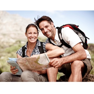 YOUNG COUPLE HIKING
