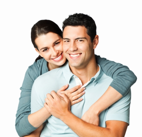 young healthy couple hugging and happy