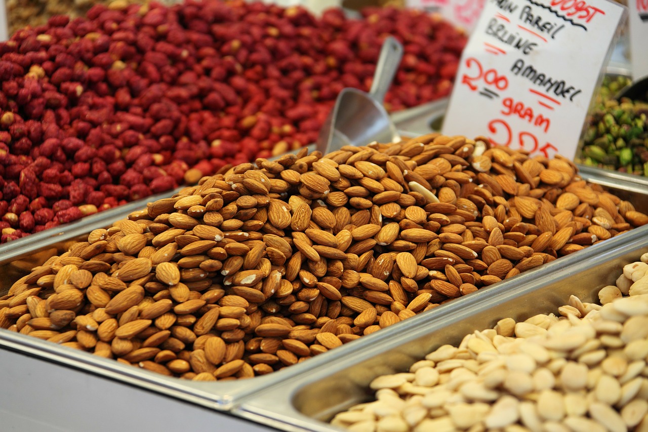large bins of assorted nuts and varying in color