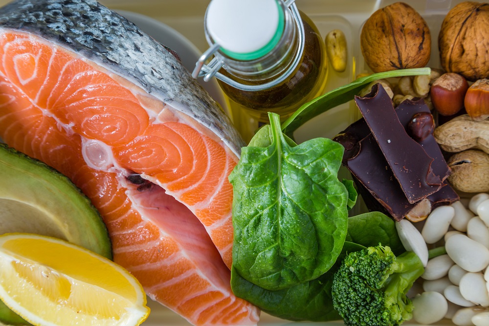omega-3 rich heart healthy foods salmon spinach nuts olive oil and chocolate